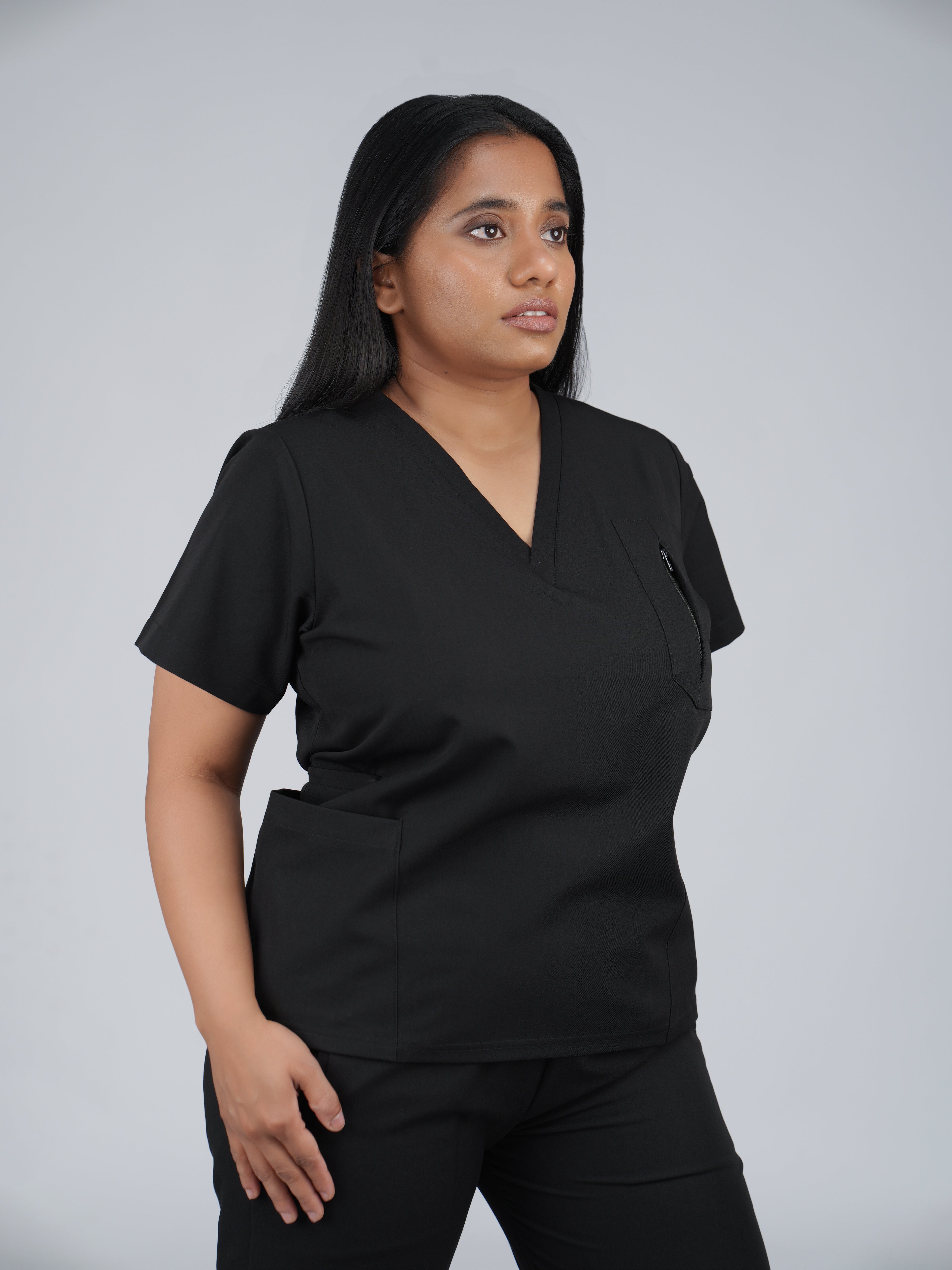 Edg premium scrub top for doctors - Black Magic - worn on model - side pocket