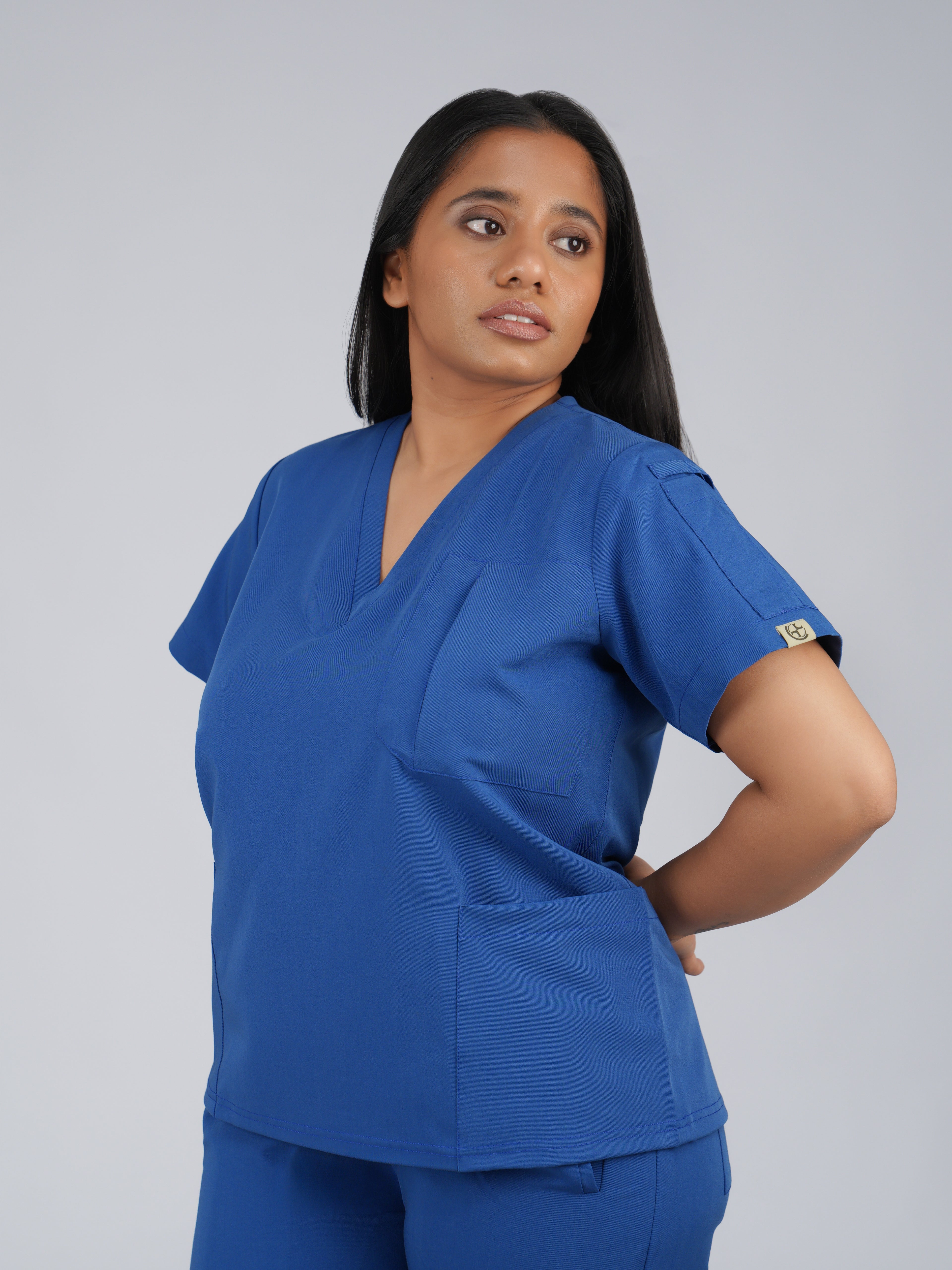 Edg premium scrub top for doctors - Blue Horse - three-quarter side pocket view