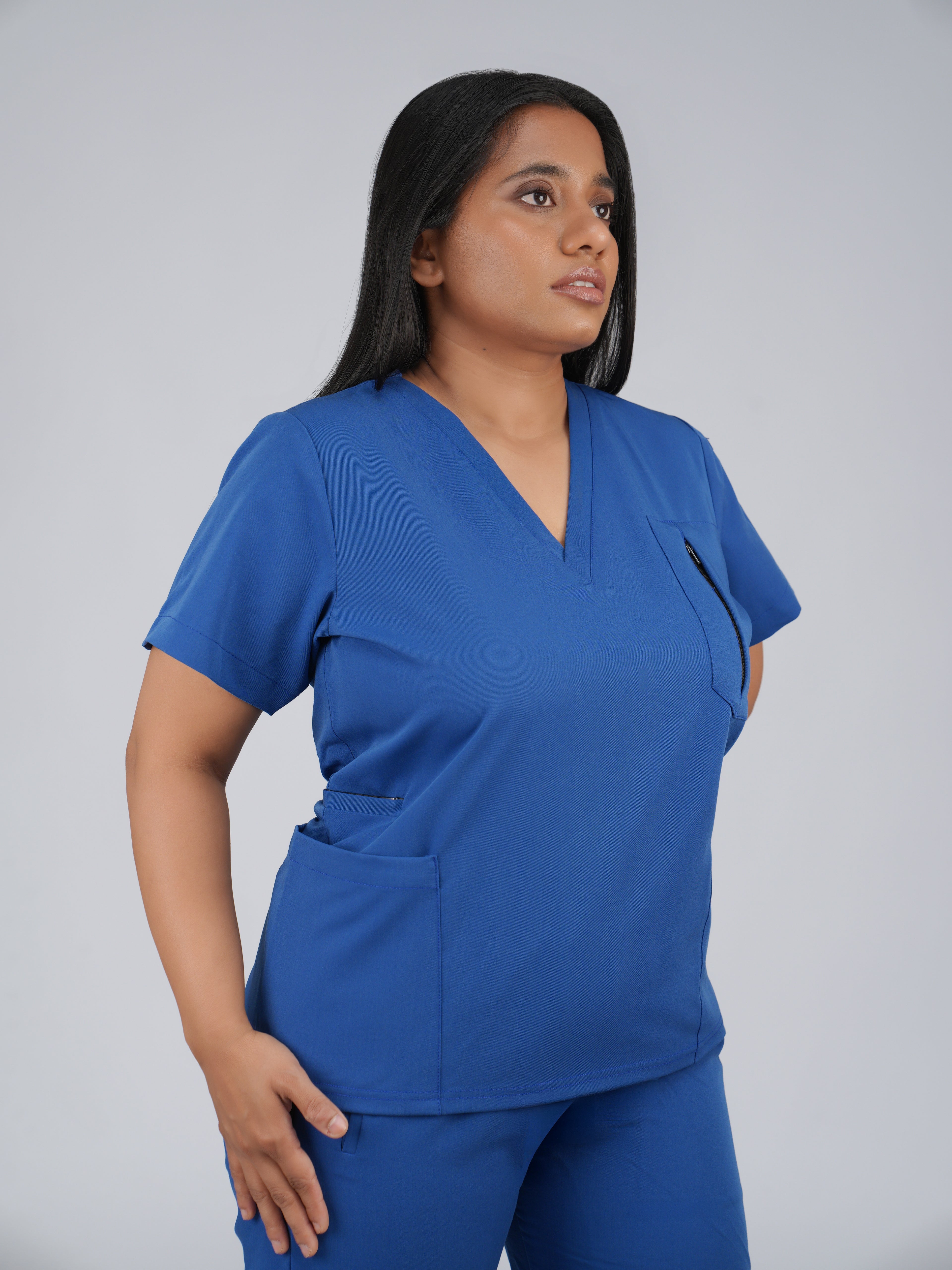 Edg premium scrub top for doctors - Blue Horse - worn on model - side pocket