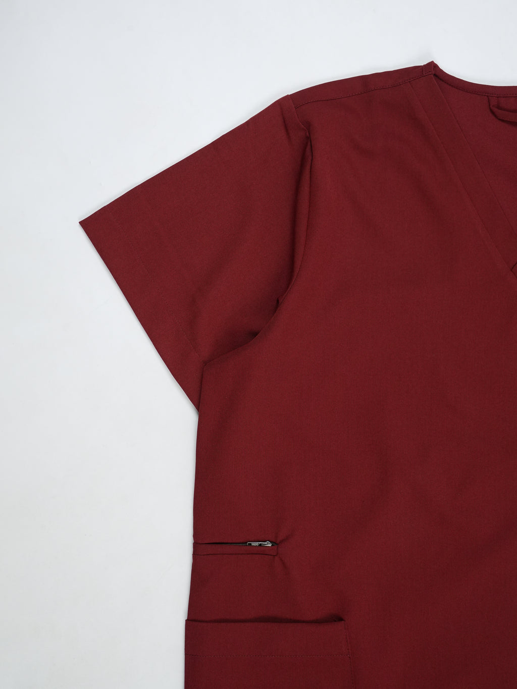 Edg premium scrub top for doctors - Cherry Jam - side pocket view