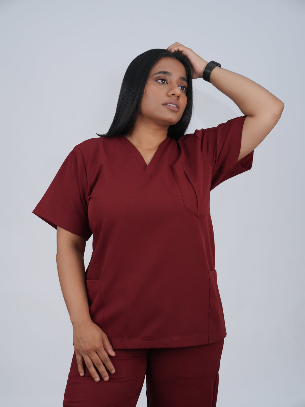 Edg premium scrub top for doctors - Cherry Jam - worn on model - side pocket