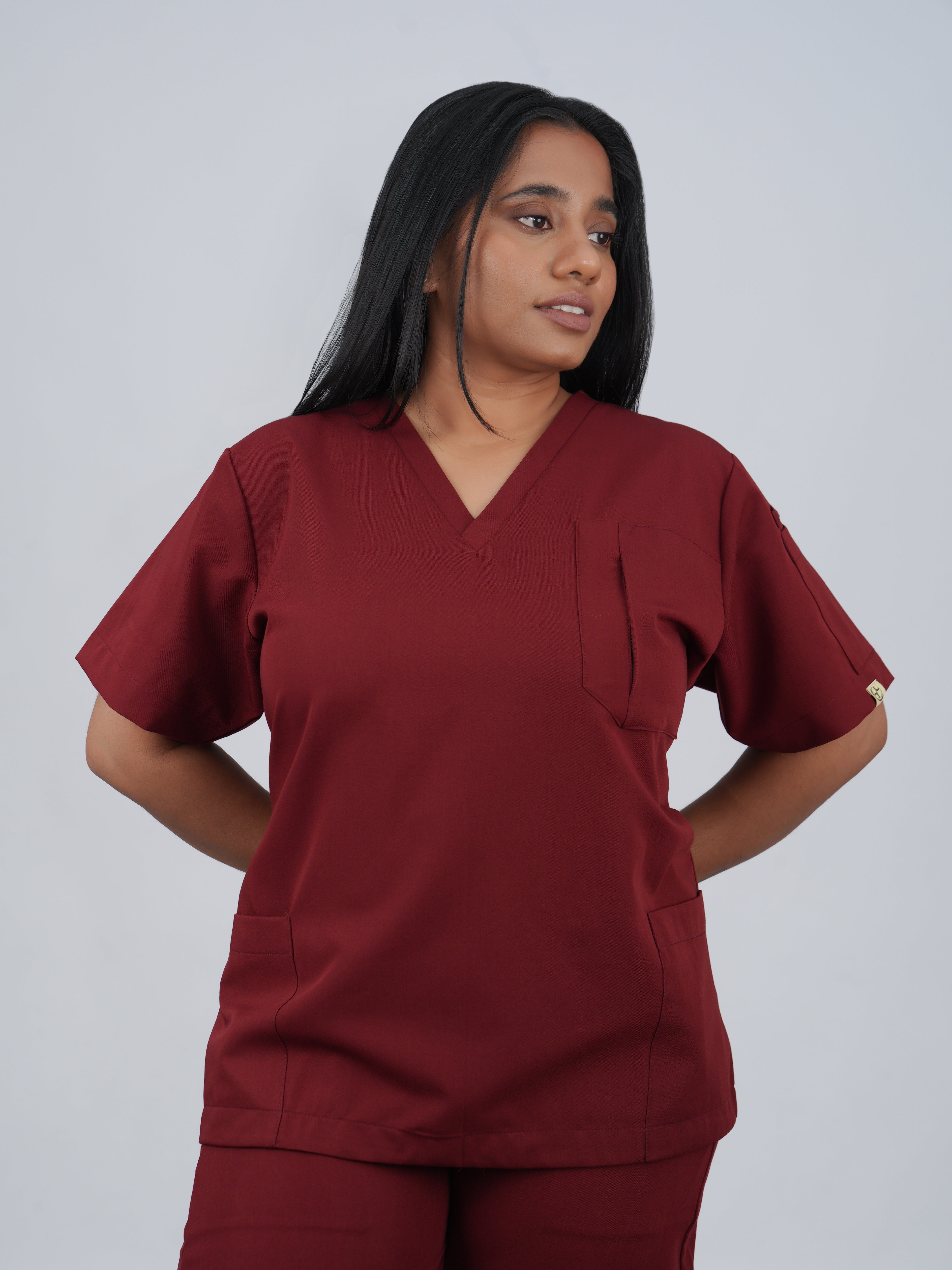 Edg premium scrub top for doctors - Cherry Jam - worn on model