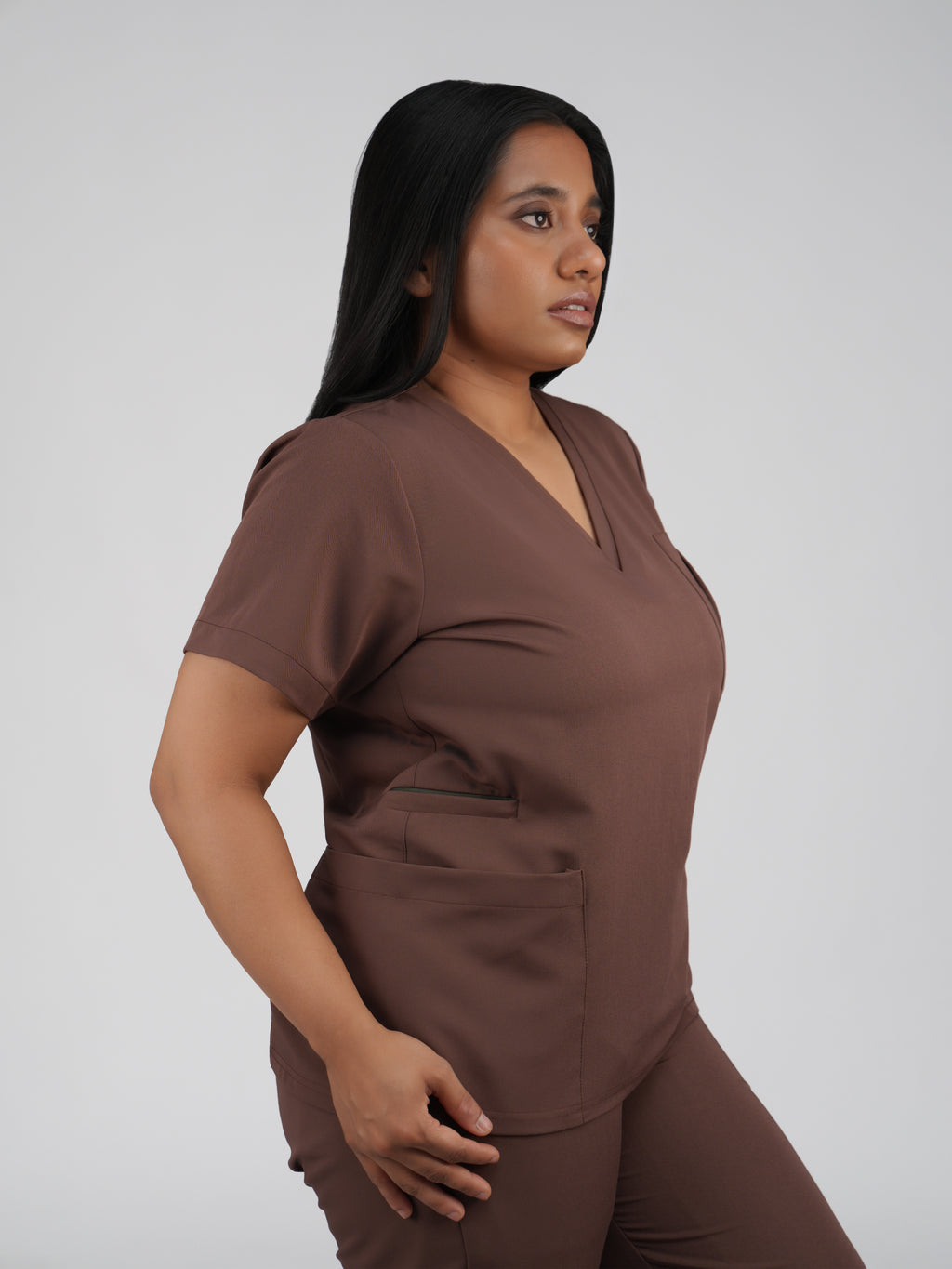 Edg premium scrub top for doctors - Mud Bath - three-quarter side pocket view