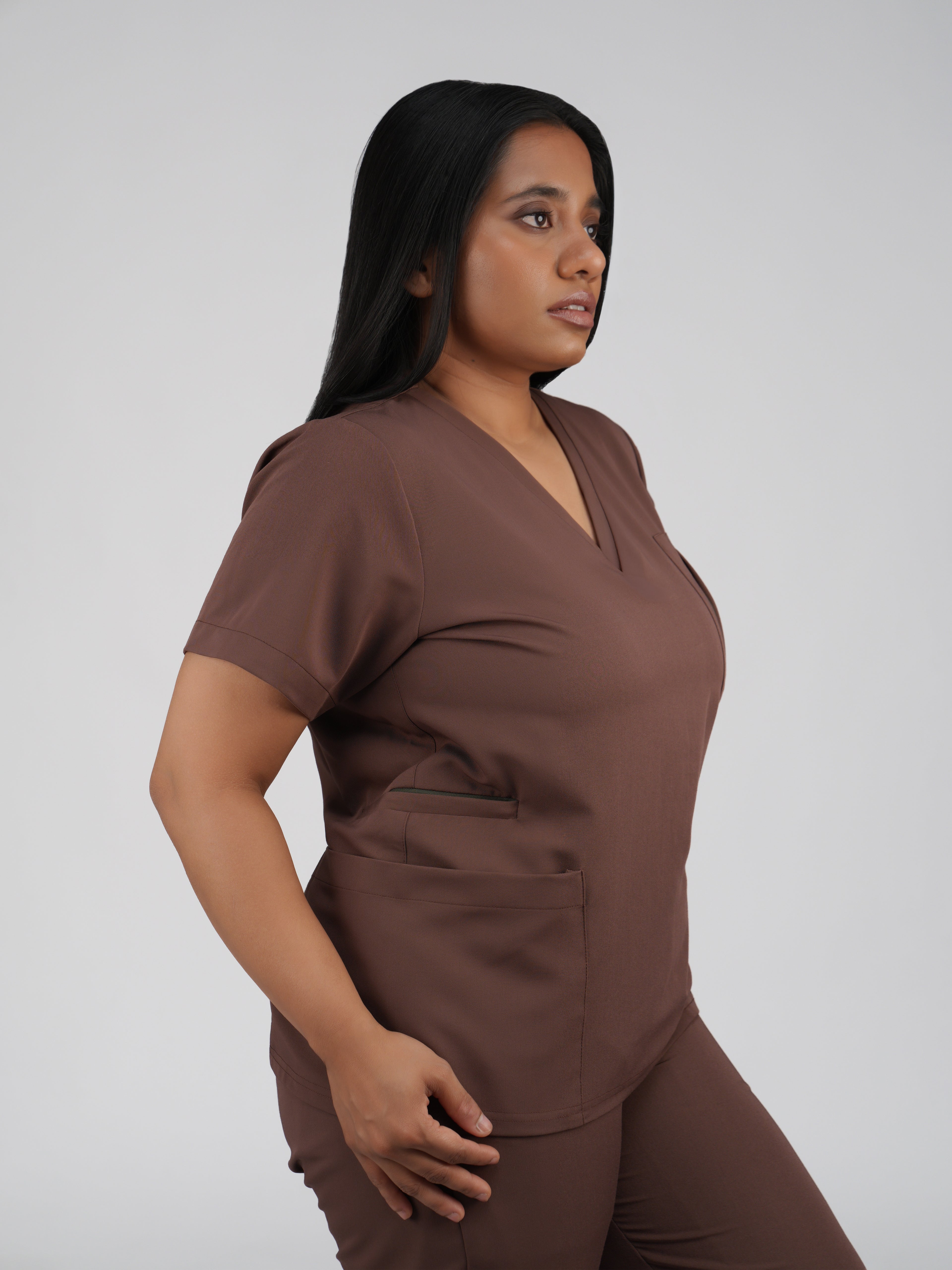 Edg premium scrub top for doctors - Mud Bath - three-quarter side pocket view