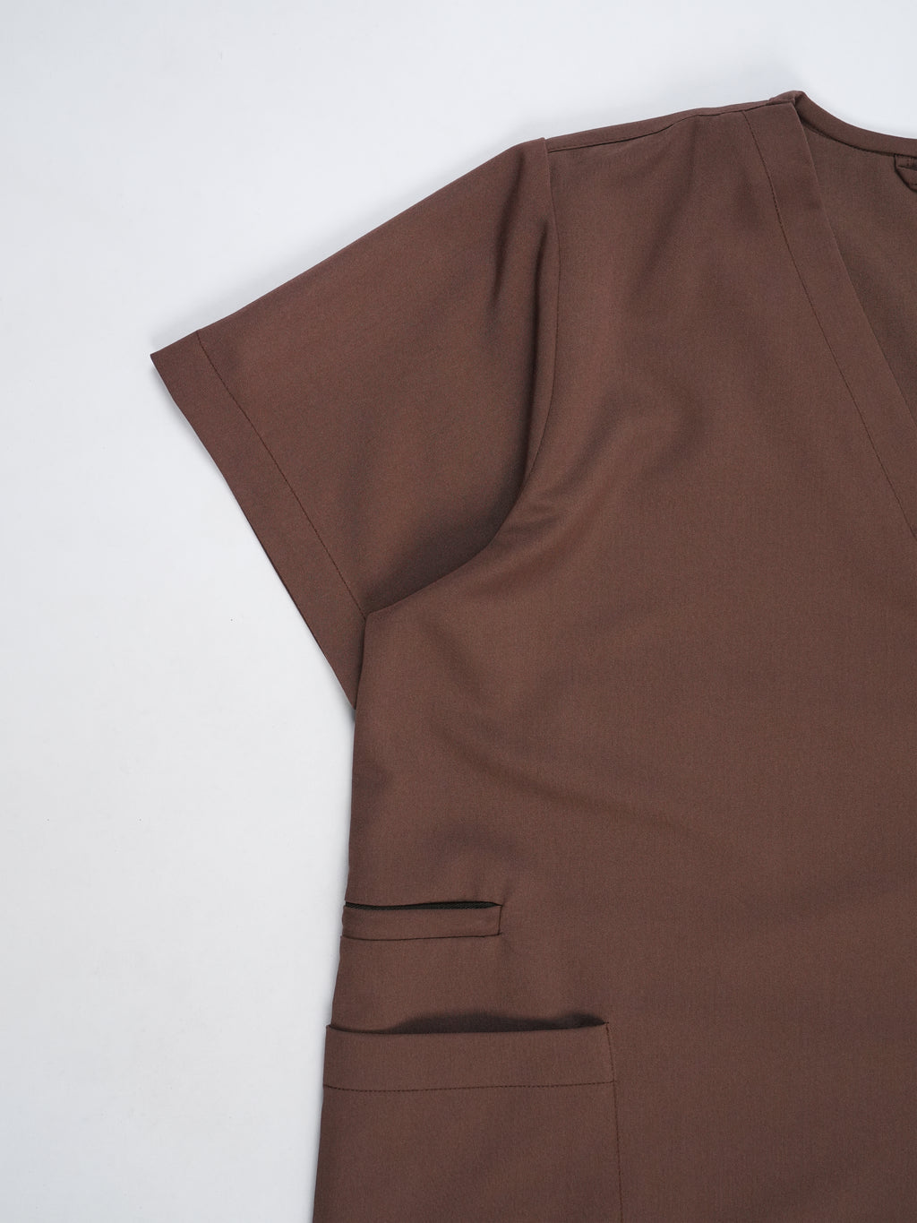 Edg premium scrub top for doctors - Mud Bath - side pocket view