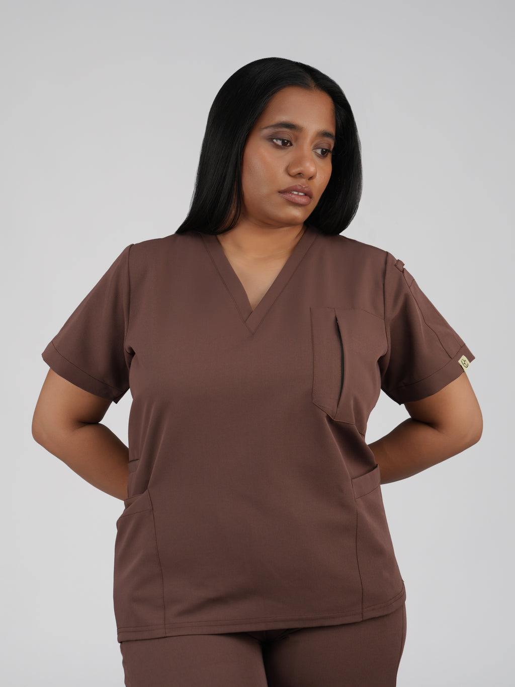 Edg premium scrub top for doctors - Mud Bath - worn on model - side pocket