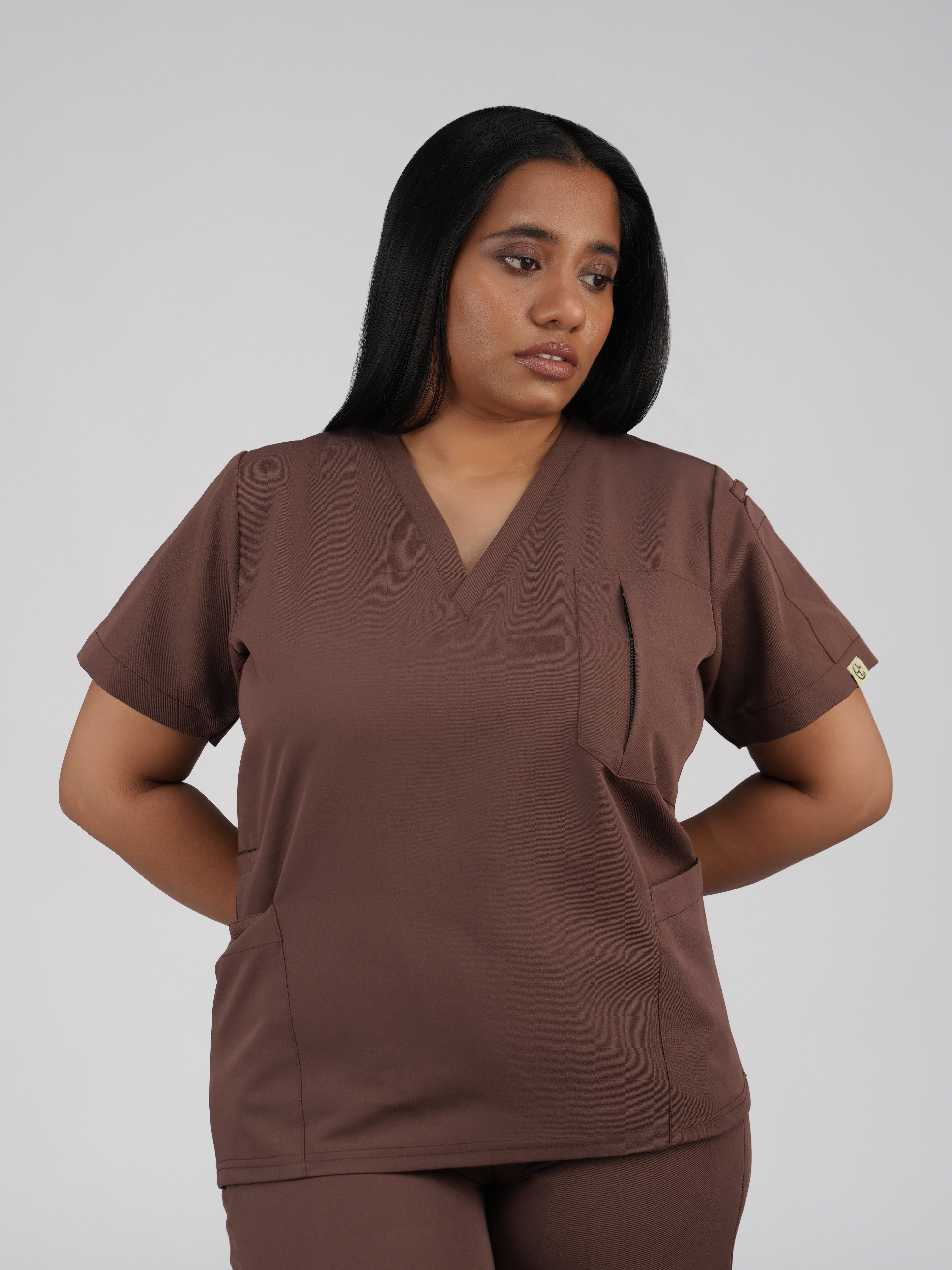 Edg premium scrub top for doctors - Mud Bath - worn on model - side pocket