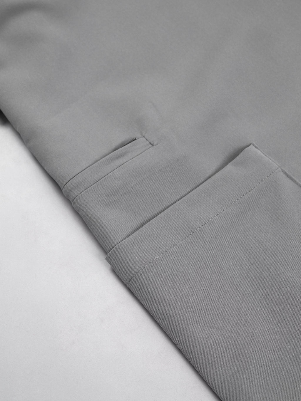 Edg premium scrub top for doctors - Pigeon Ash - zip pocket detail