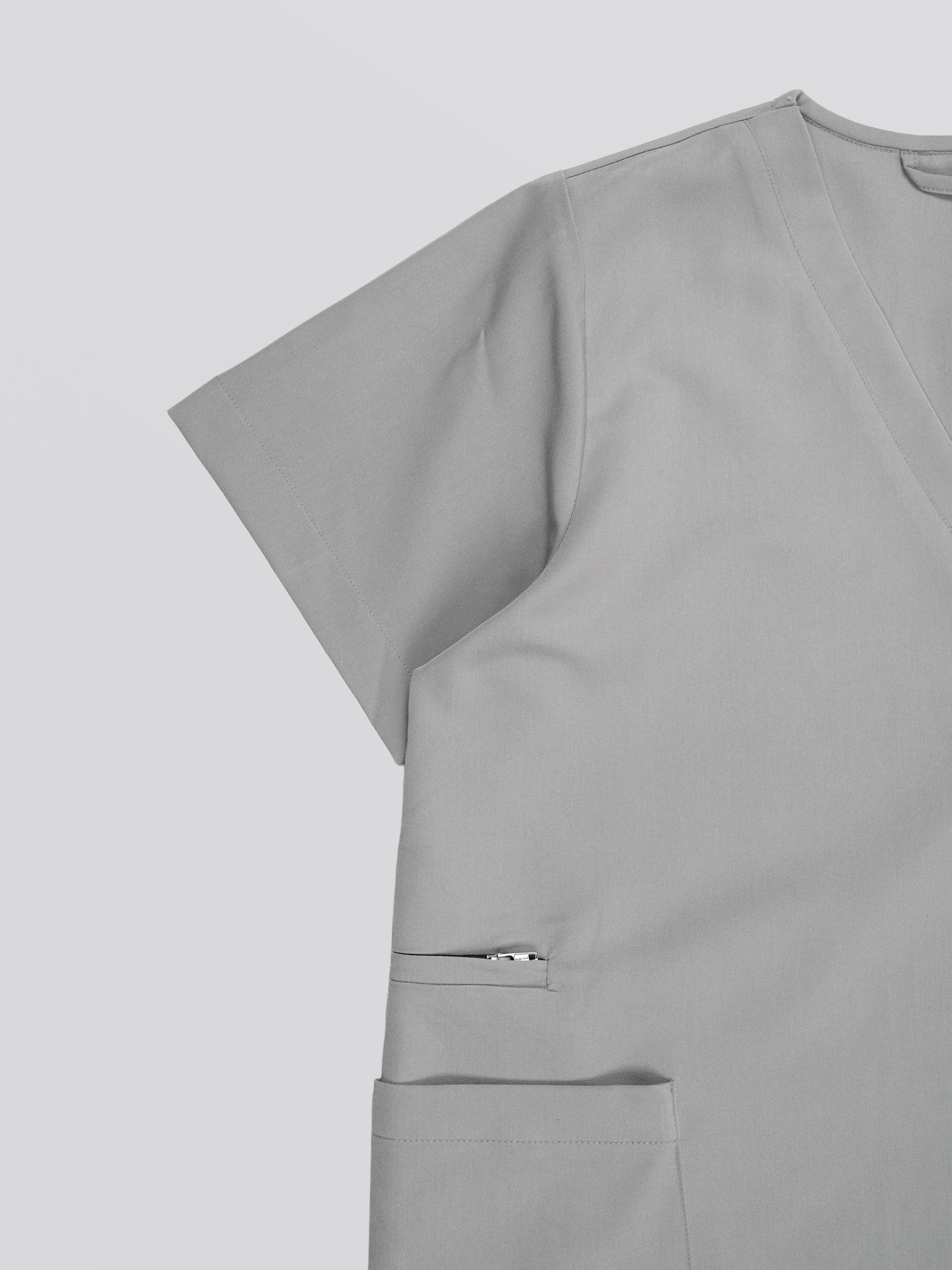 Edg premium scrub top for doctors - Pigeon Ash - three-quarter side pocket view