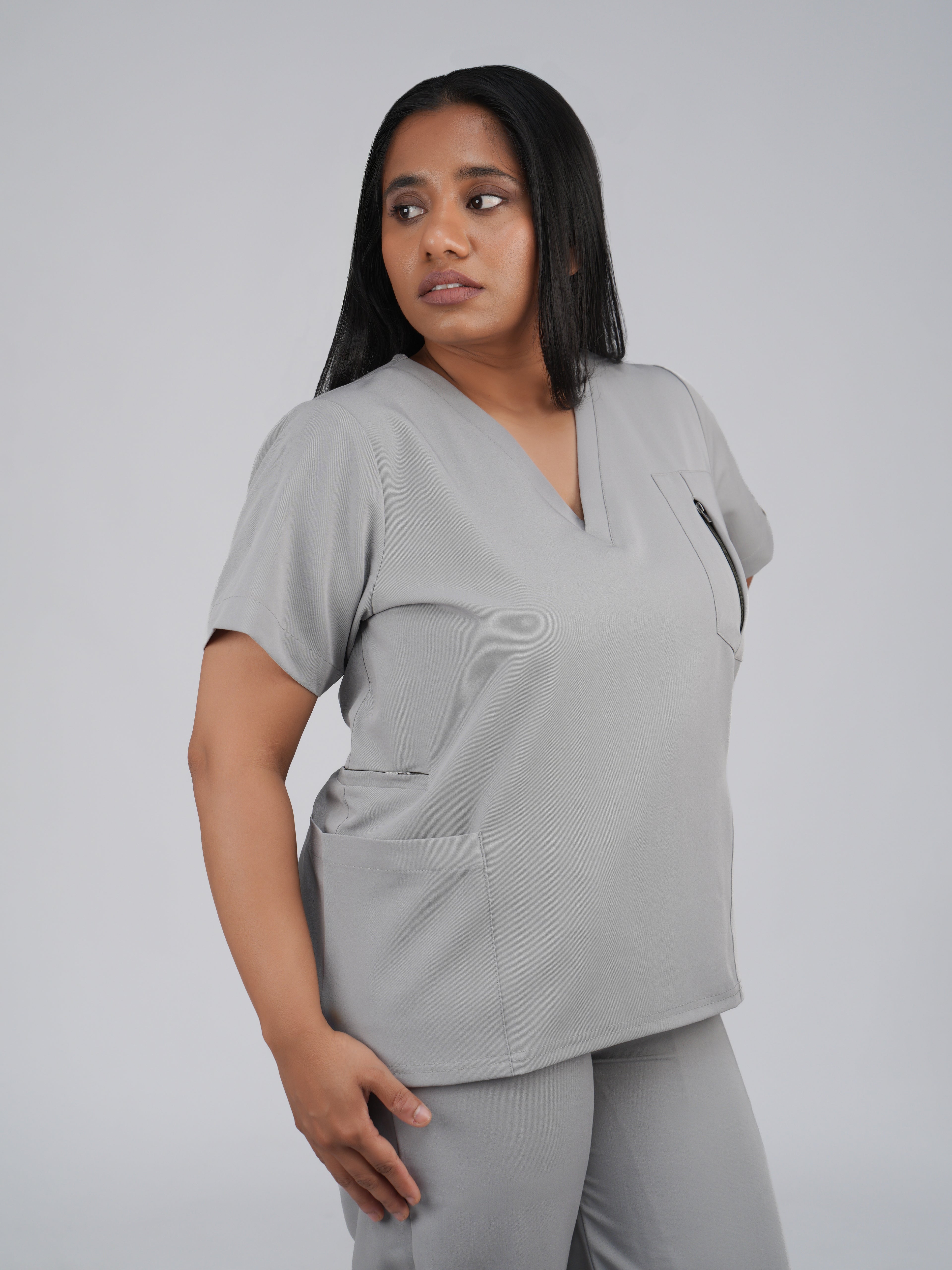 Edg premium scrub top for doctors - Pigeon Ash - worn on model - side pocket