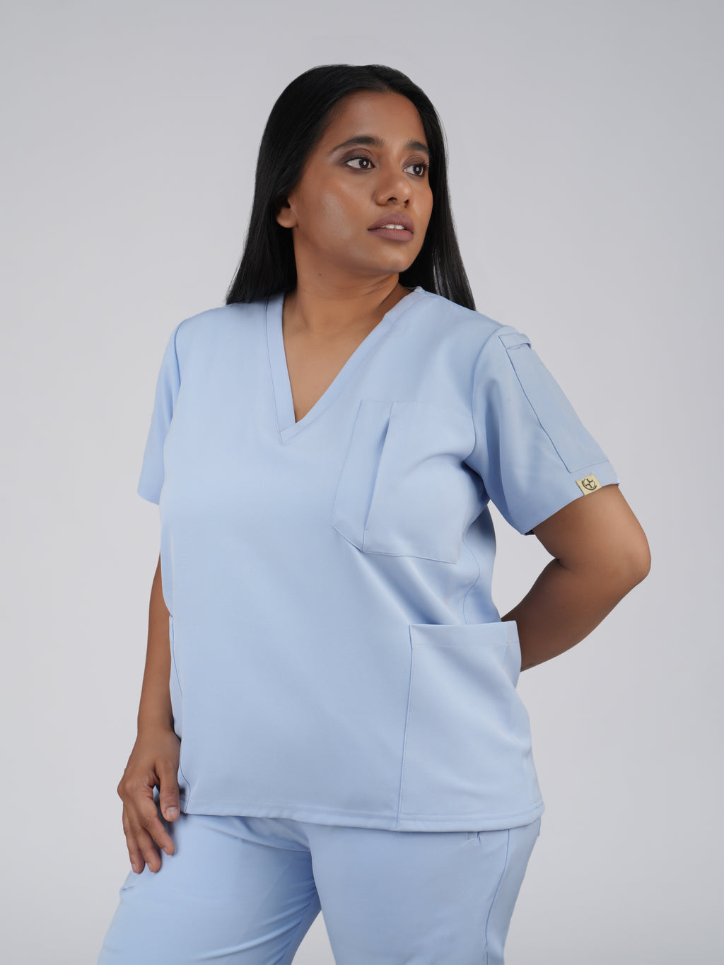 Edg premium scrub top for doctors - Soft Cloud - three-quarter side view