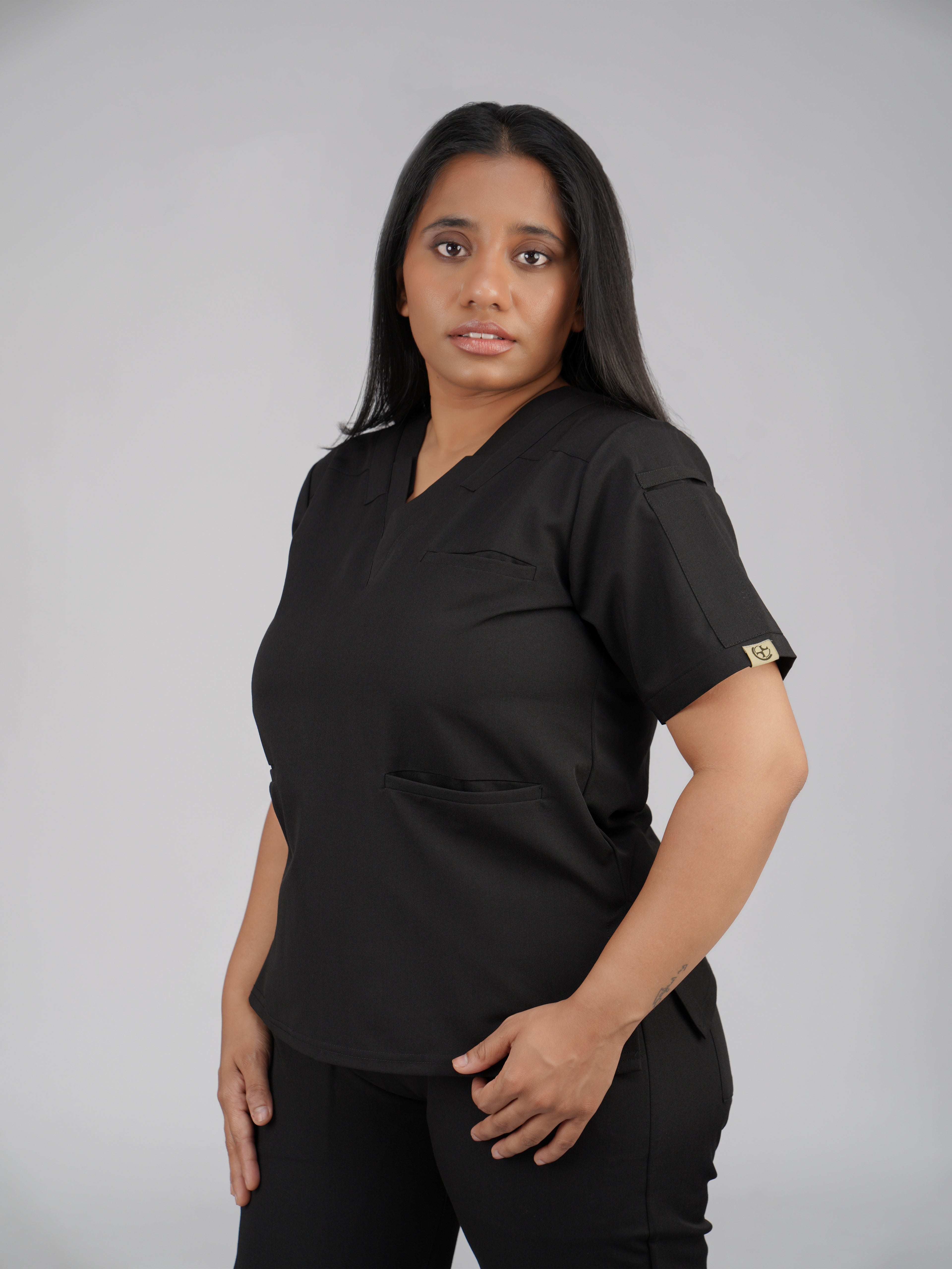 Splet premium scrub top for doctors - Black magic - three-quarter side view