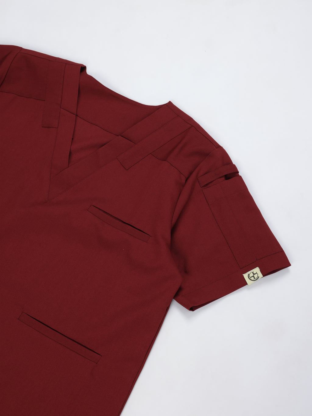 Splet premium scrub top for doctors - Cherry Jam- three-quarter side view