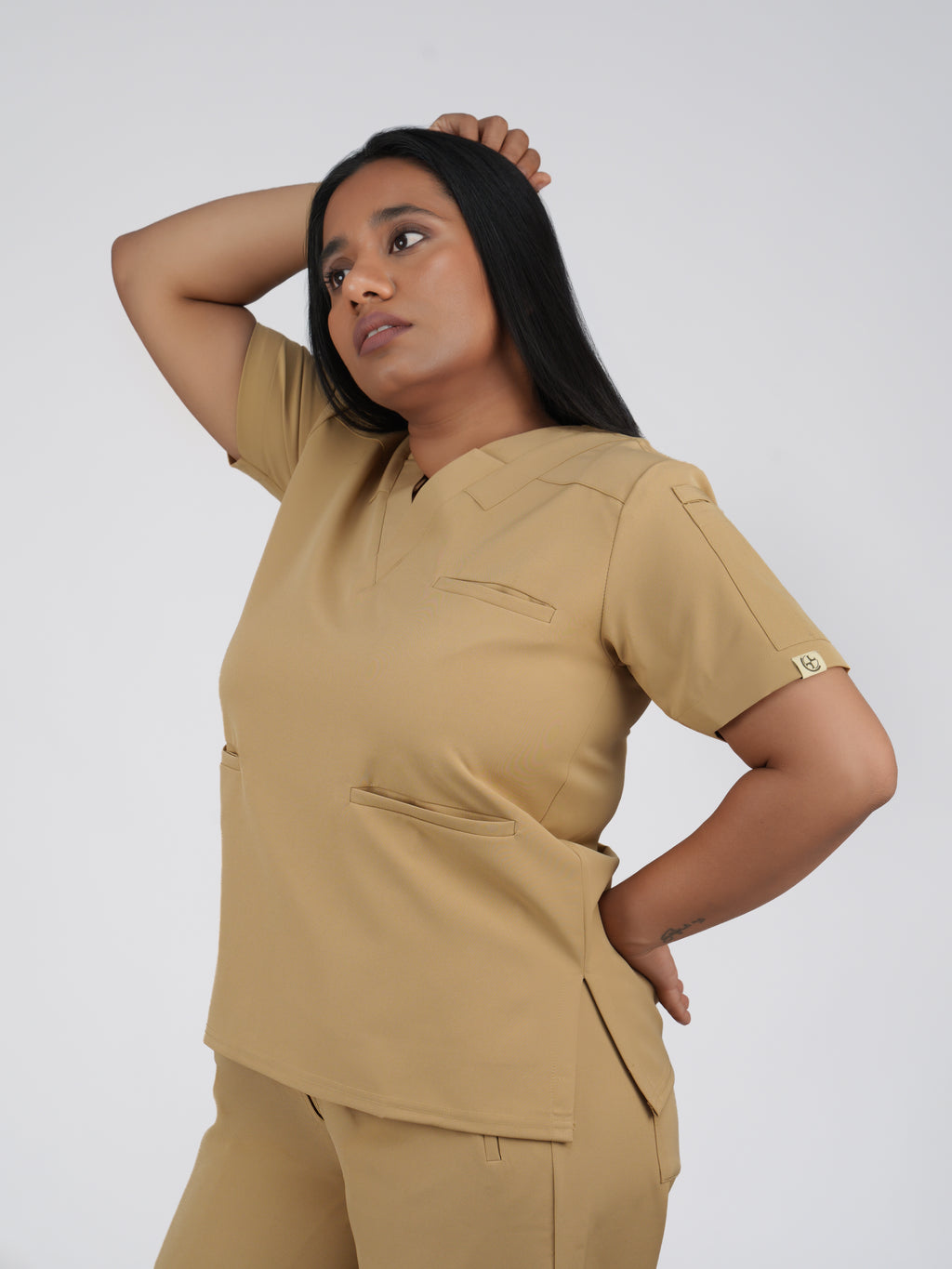Splet premium scrub top for doctors - Sand Skin - three-quarter side view