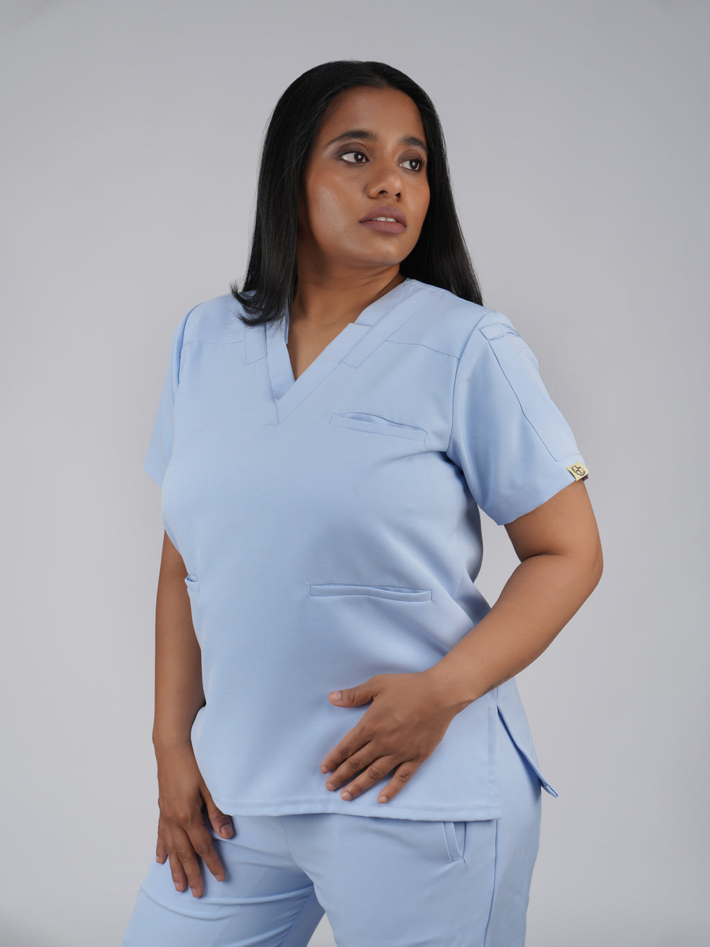 Splet premium scrub top for doctors - Soft Cloud - three-quarter side view