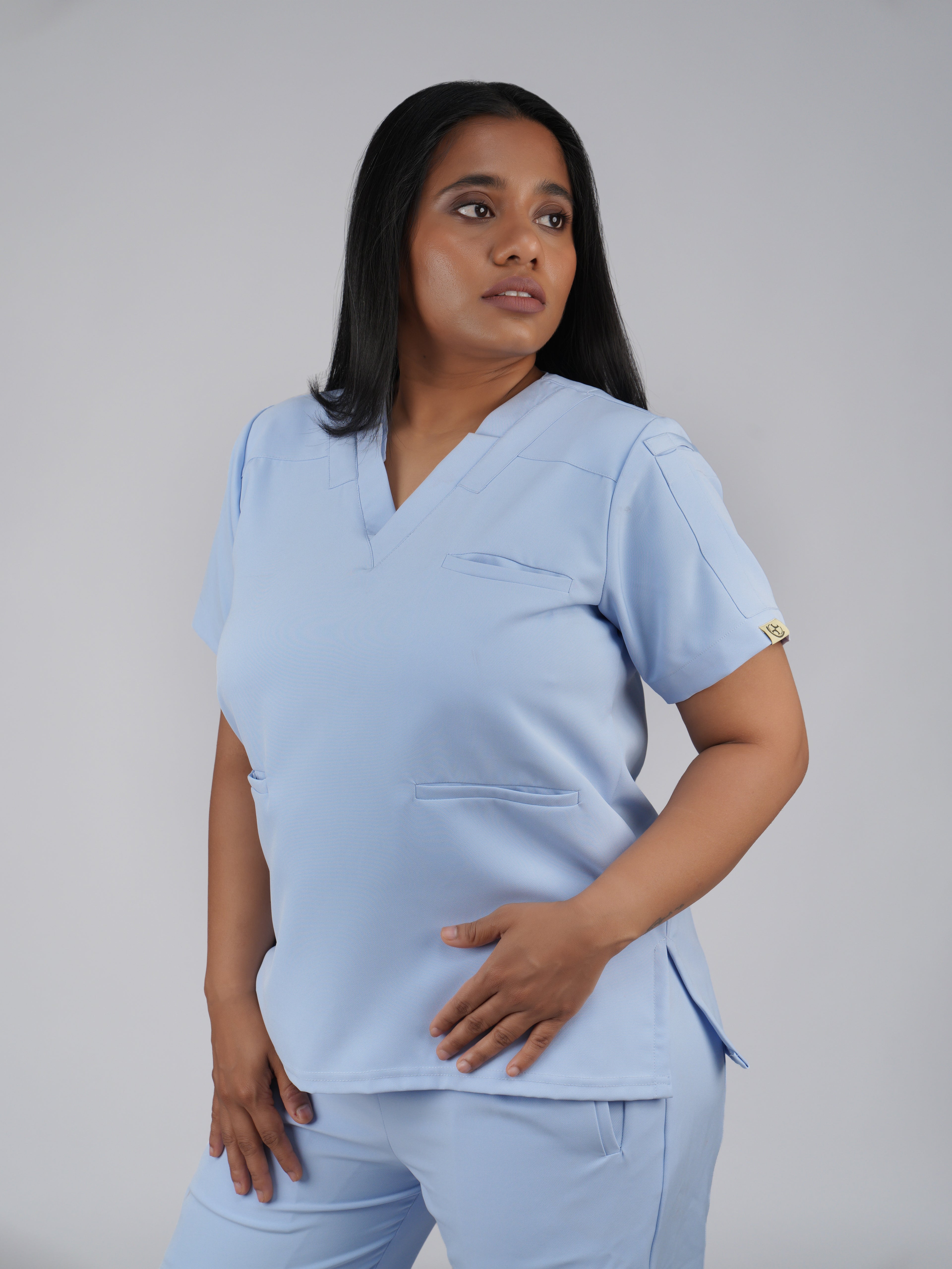 Splet premium scrub top for doctors - Soft Cloud - three-quarter side view