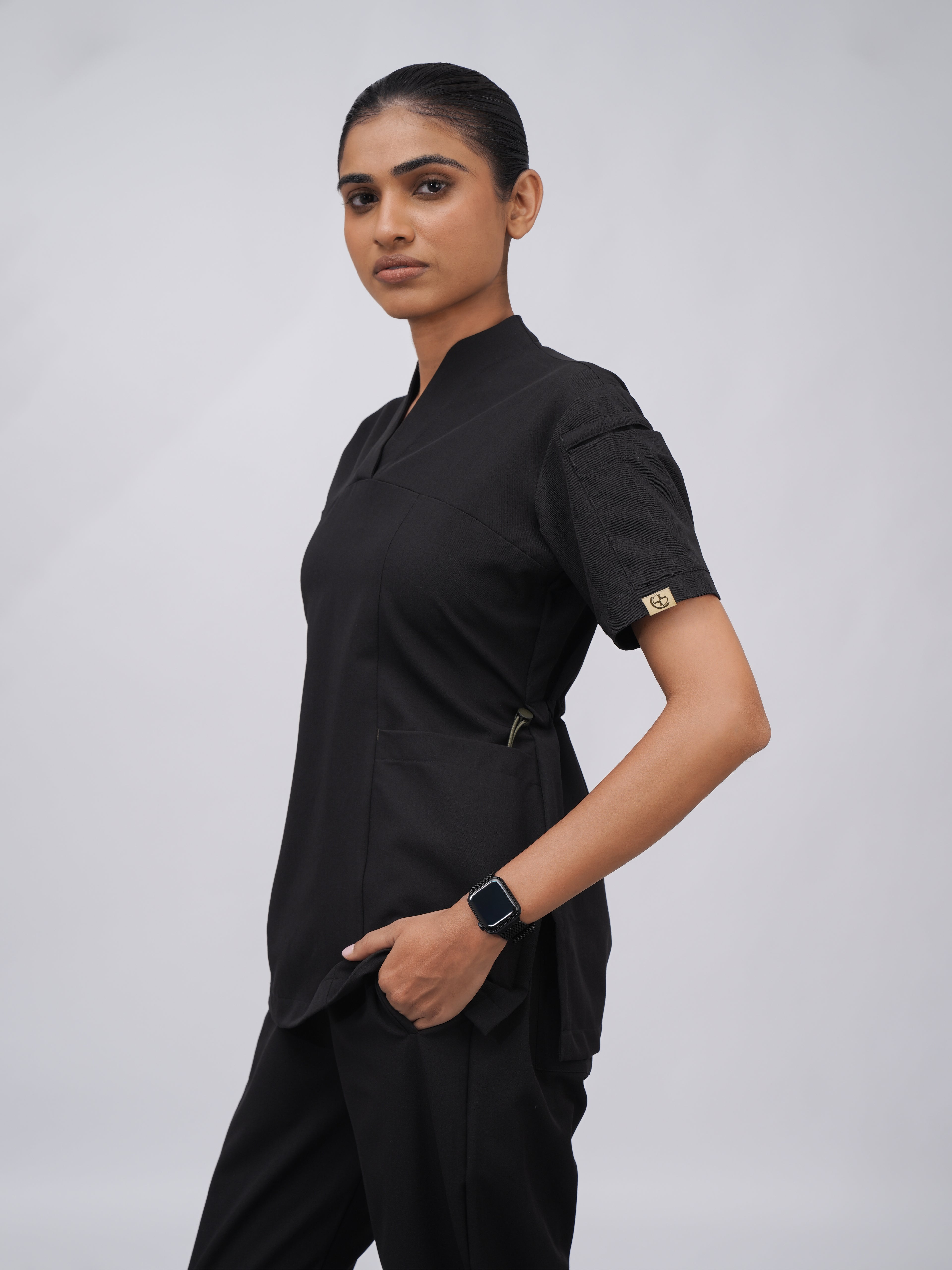 Sqwish premium scrub top for doctors - Black Magic - three-quarter side view