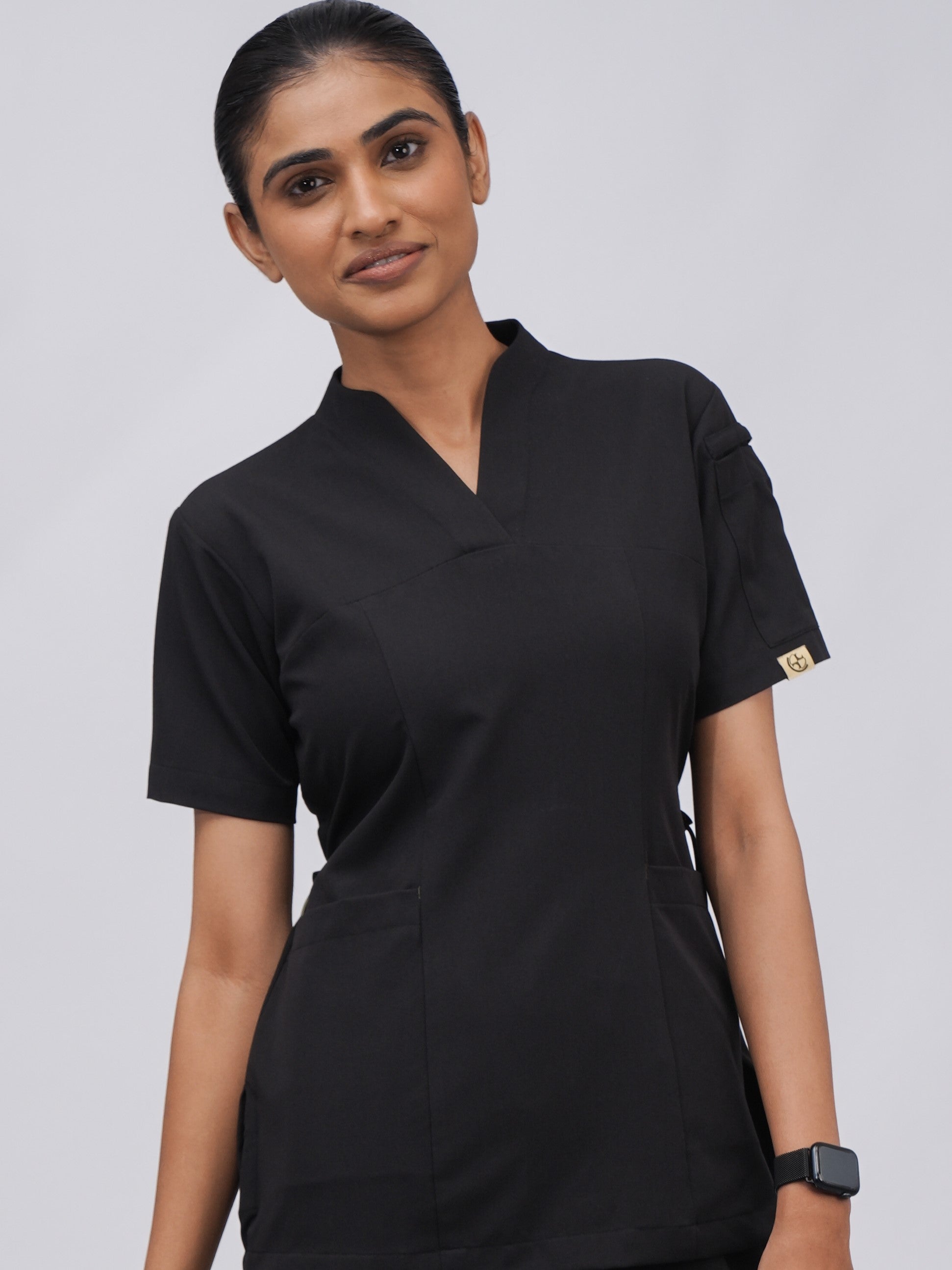 Sqwish premium scrub top for doctors - Black Magic - worn on model