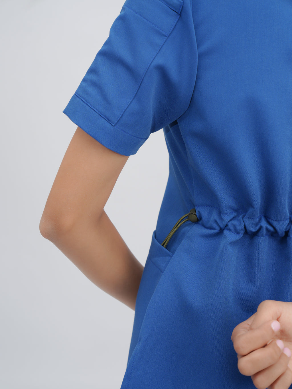 Sqwish premium scrub top for doctors - Blue Horse - adjustable side-cord detail
