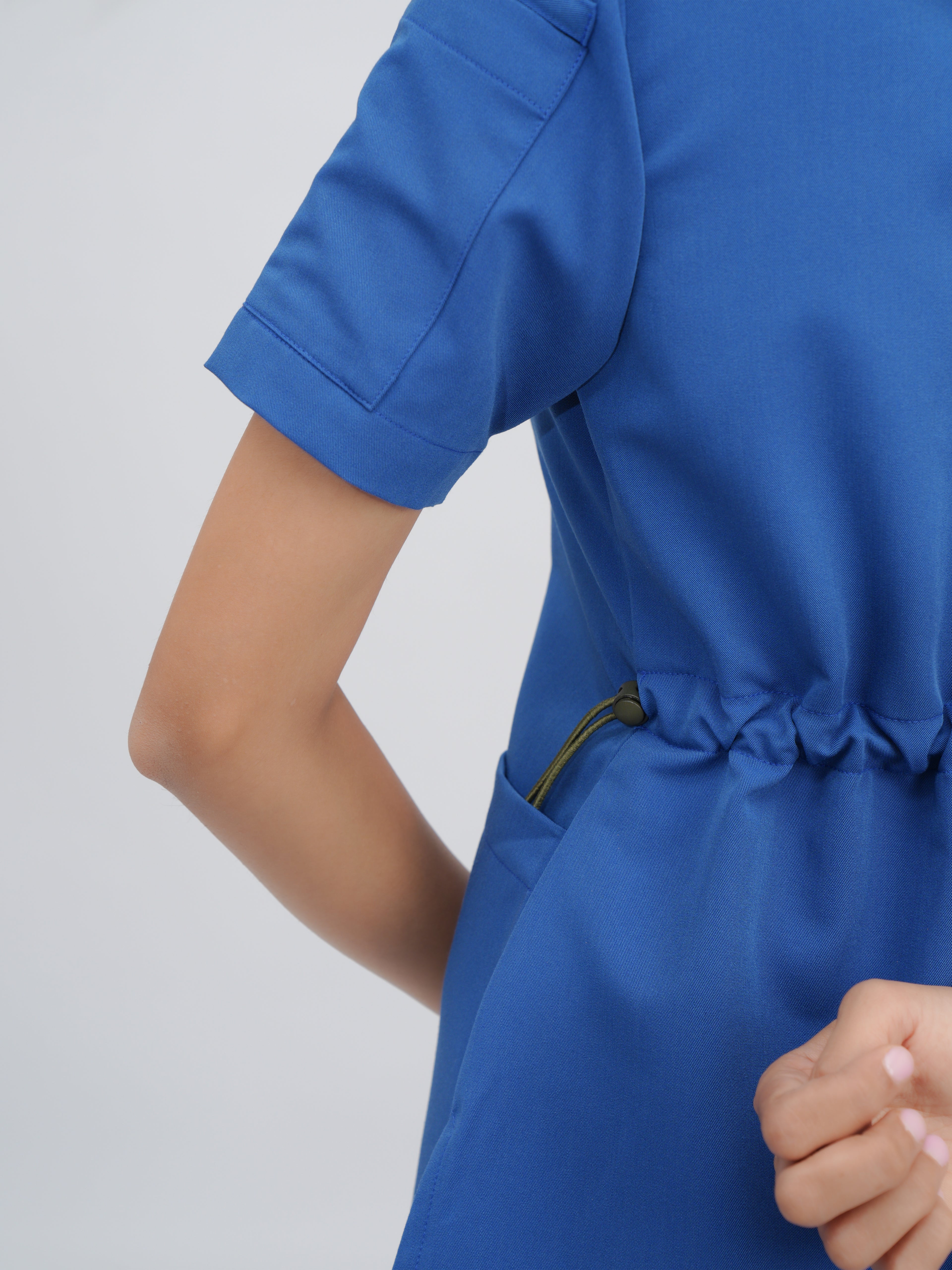 Sqwish premium scrub top for doctors - Blue Horse - adjustable side-cord detail