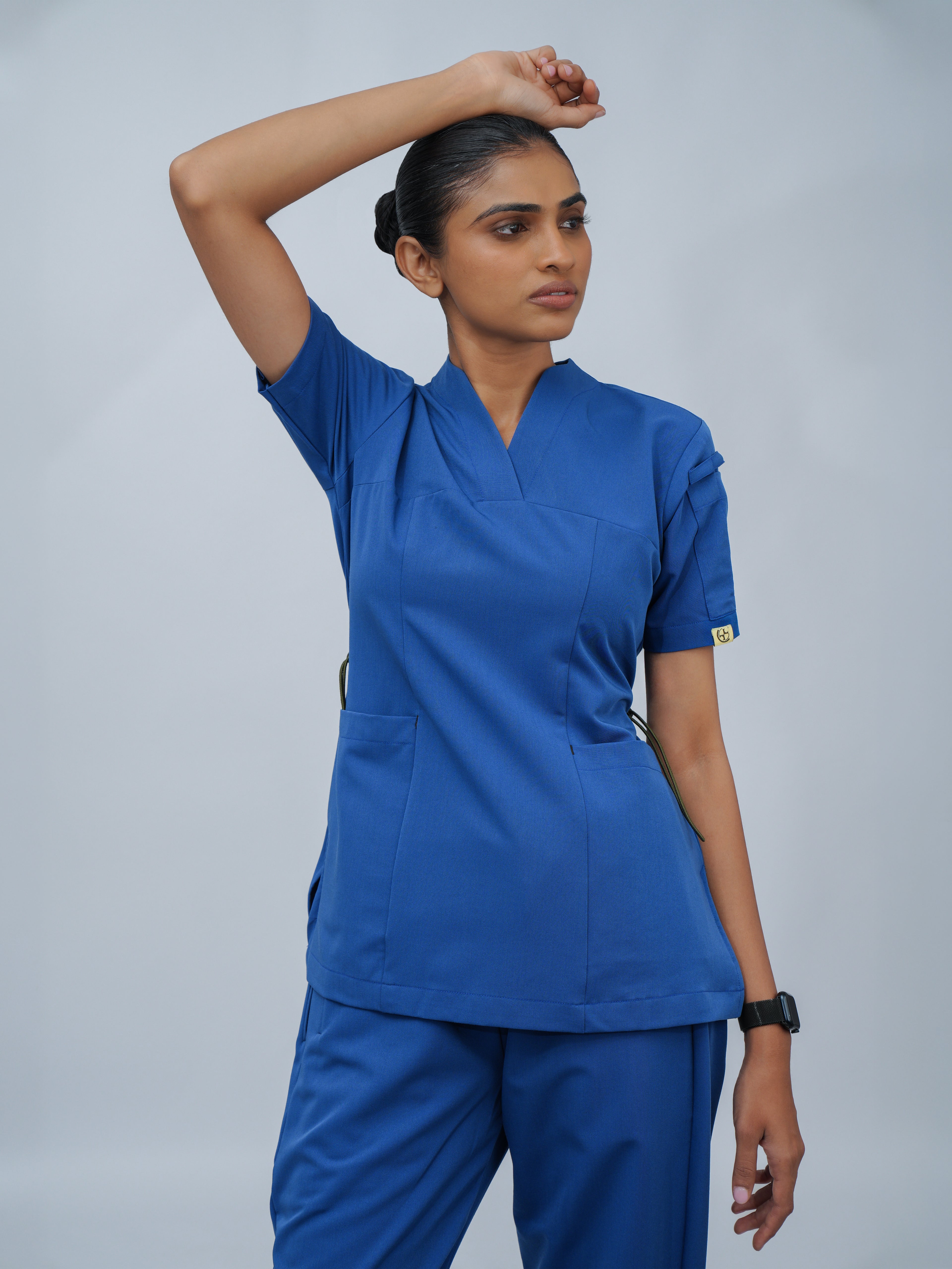 Sqwish premium scrub top for doctors - Blue Horse - worn on model