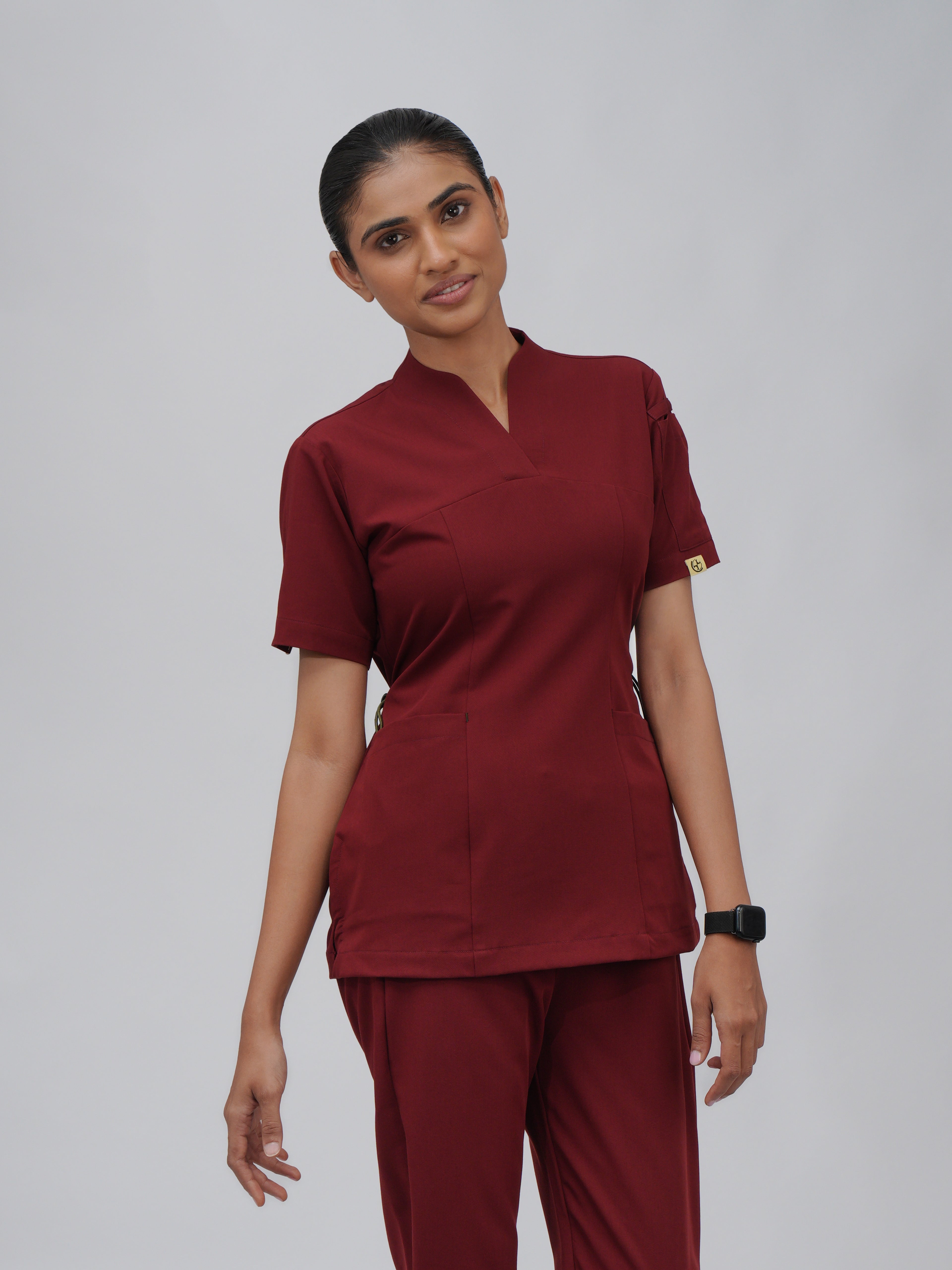Sqwish premium scrub top for doctors - Cherry Jam - worn on model