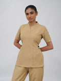Sqwish premium scrub top for doctors - Sand Skin - front view