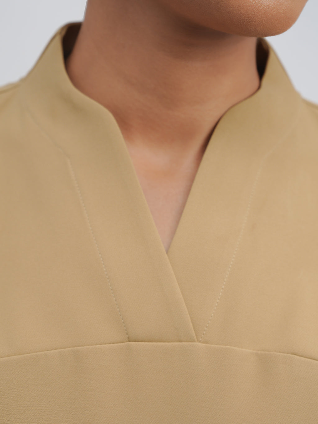 Sqwish premium scrub top for doctors - Sand Skin - structured v neck