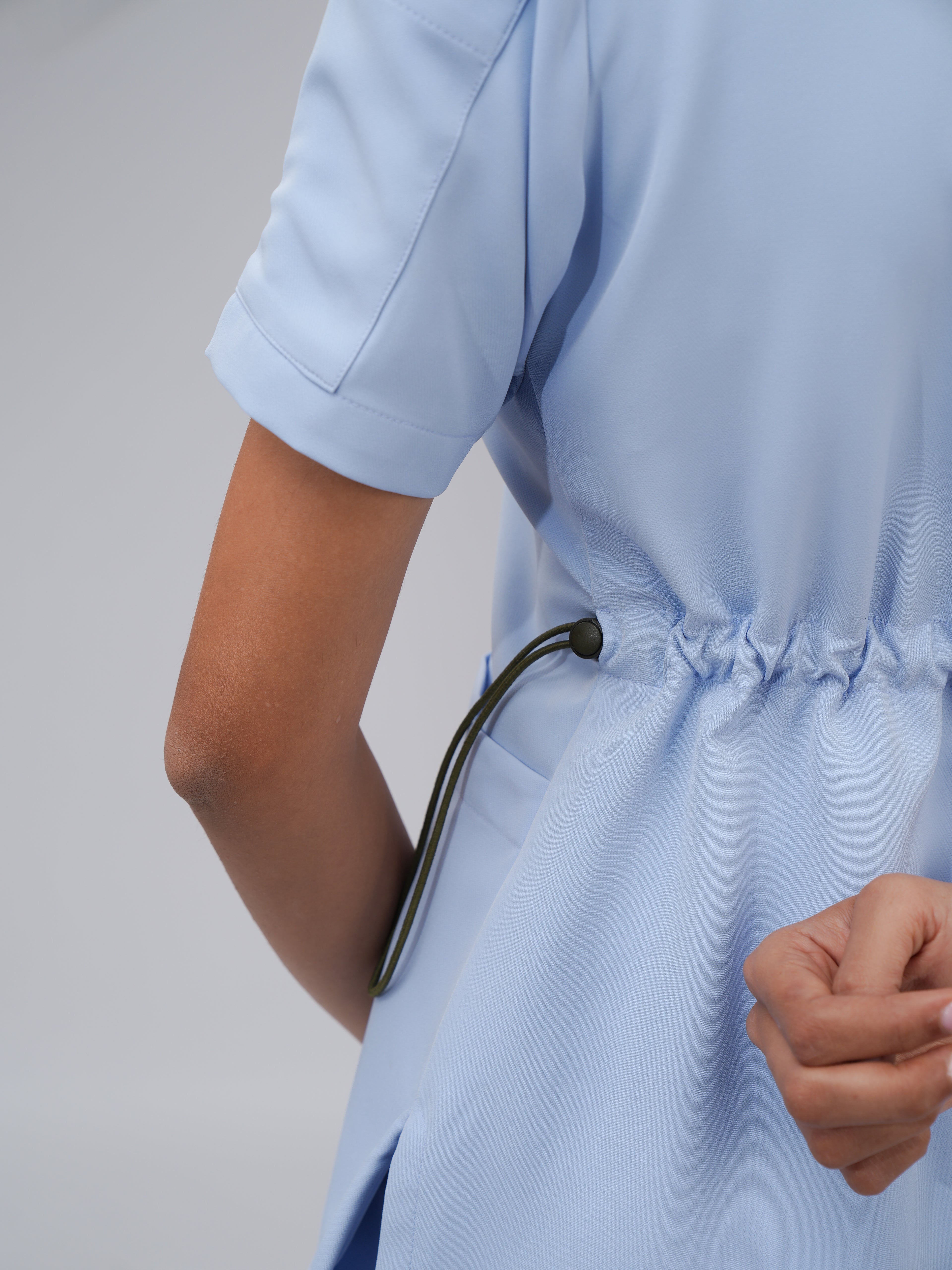 Sqwish premium scrub top for doctors - Soft Cloud - back view - adjustable side-cord detail