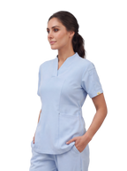 Sqwish premium scrub top for doctors - Soft Cloud - three-quarter side view