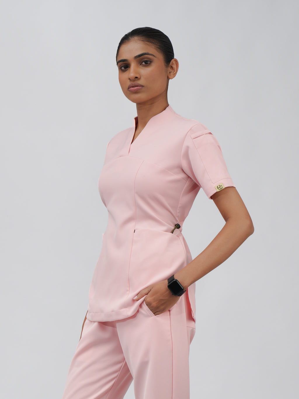 Sqwish premium scrub top for doctors - Unicorn Wing - three-quarter side view