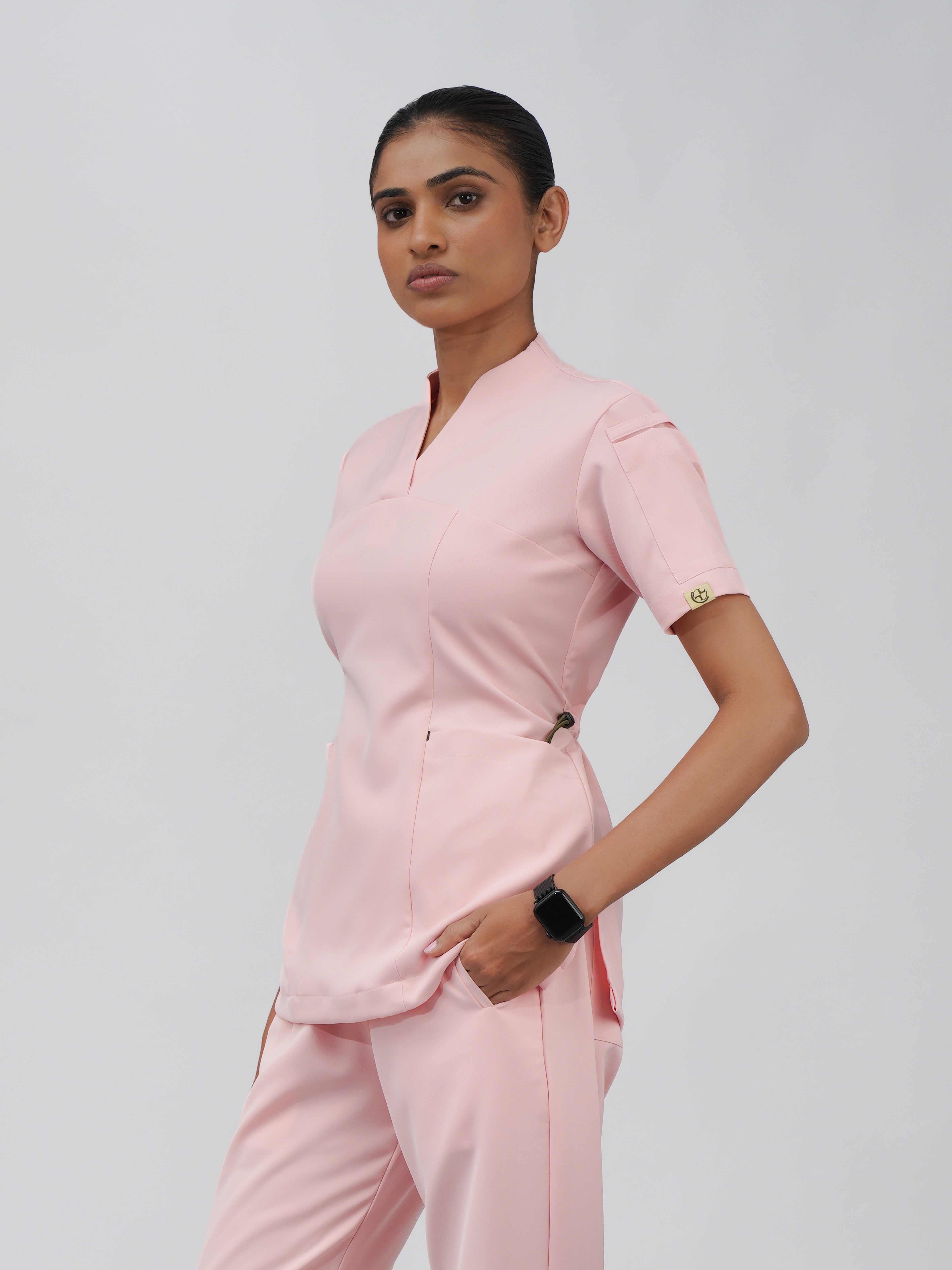 Sqwish premium scrub top for doctors - Unicorn Wing - three-quarter side view