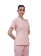 Sqwish premium scrub top for doctors - Unicorn Wing - nine-quarter side view